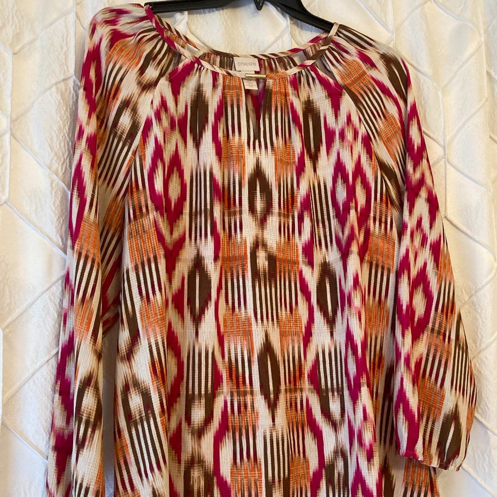 Ikat printed blouse in fall colors with cutouts at neckline - Chico's size 3
